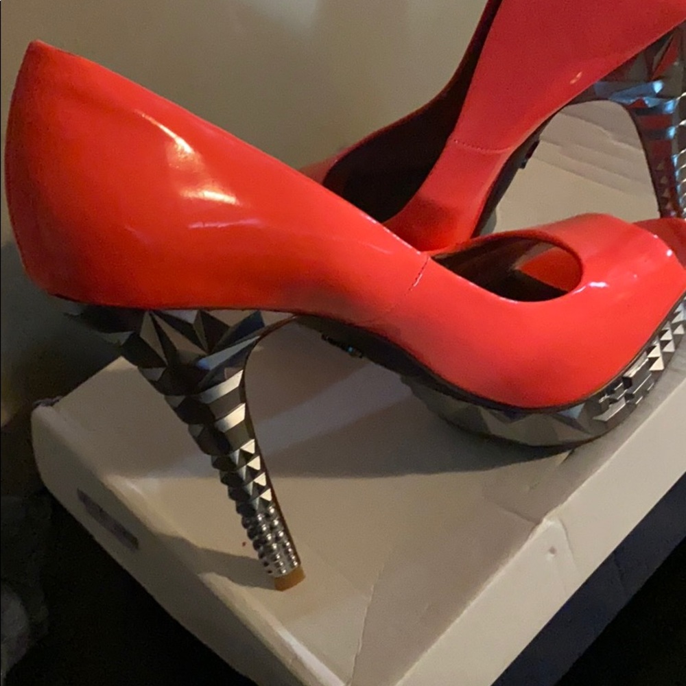 Electric coral spiked heels